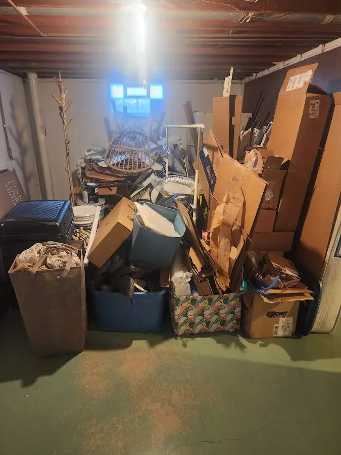 Roll-off dumpster container at job site for 2 Yard Dumpster Rental in Oak Forest